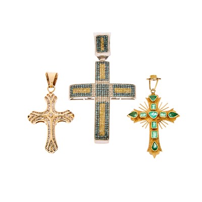 Lot 1210 - Three Yellow and White Gold, Diamond, Colored Diamond and Emerald Cross Pendants