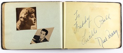 Lot 130 - An autograph album with Lucille Ball, Desi Arnaz, Lana Turner, Bert Lahr and others