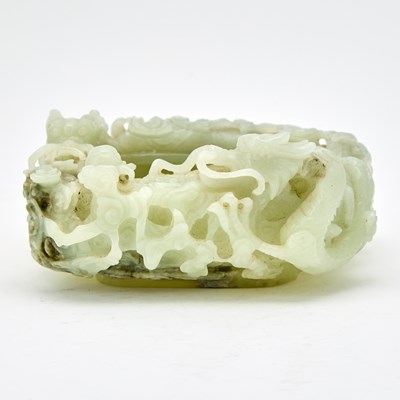Lot 35 - A Chinese Celadon Jade Square Form Dragon Brush Washer