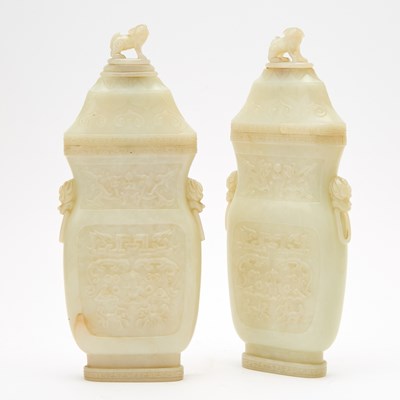 Lot A Pair of Chinese White Jade Flattened Vases and Covers