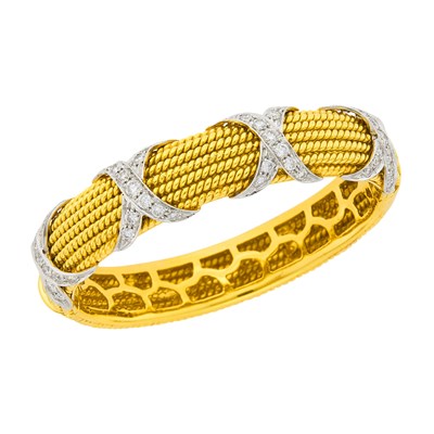 Lot 1179 - Two-Color Gold and Diamond Bangle Bracelet