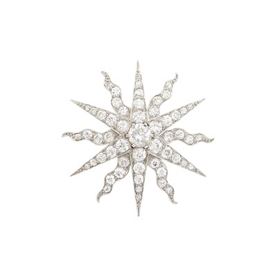 Lot 1069 - Antique Platinum, Gold and Diamond Starburst Brooch