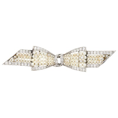 Lot 1067 - Belle Époque Platinum, Seed Pearl and Diamond Bow Brooch