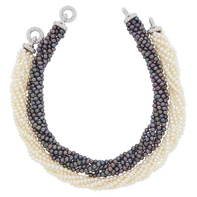 Lot 1170 - Verdura Two Six Strand Black and White Cultured Pearl Torsade Necklaces with White Gold and Diamond Clasps