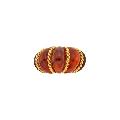 Lot 1019 - Attributed to Seaman Schepps Carved Amber and Gold 'Shrimp' Ring