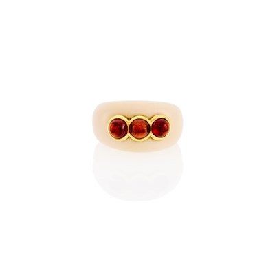 Lot 2067 - Gold, Enamel and Cabochon Garnet Ring