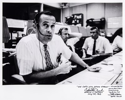 Lot 228 - Apollo 11 Mission Control photograph inscribed by Charlie Duke and Fred Haise