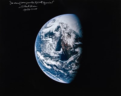 Lot 234 - Apollo 13 Earth photograph inscribed by astronaut Fred Haise