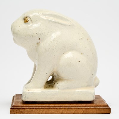 Lot 166 - A Chinese White Glazed Figure of Seated Rabbit