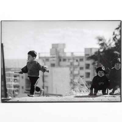 Lot 76 - W. Eugene Smith, Children Playing, Japan, likely 1970s