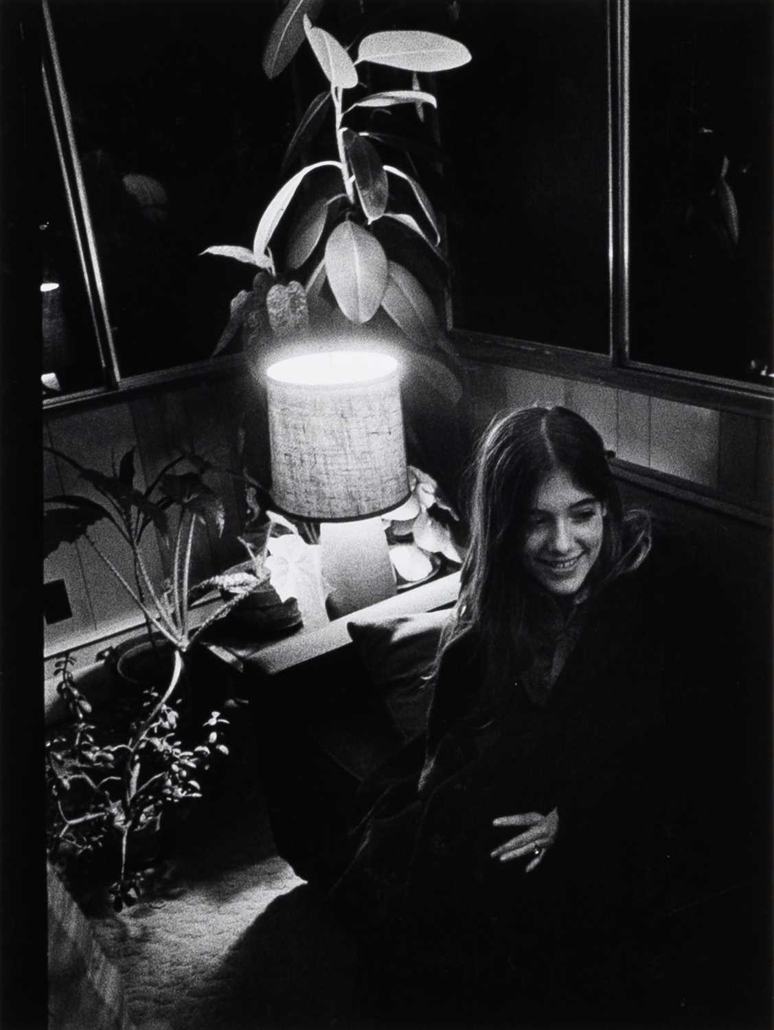 Lot 77 - W. Eugene Smith, Young woman by lamplight, likely 1970s