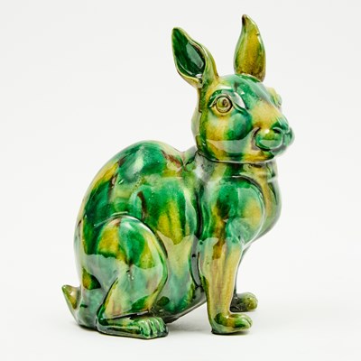 Lot 558 - A Chinese Sancai Glazed Porcelain Figure of a Rabbit