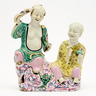 Lot 534 - A Chinese Enameled Porcelain Figure of Hehe Erxian