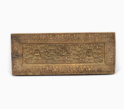 Lot 1074 - Tibetan Carved and Parcel Gilt Hardwood Sutra Cover