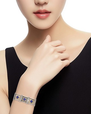 Lot 146 - Carlo Giuliano Gothic Revival Silver, Silver-Gilt and Lapis Bracelet