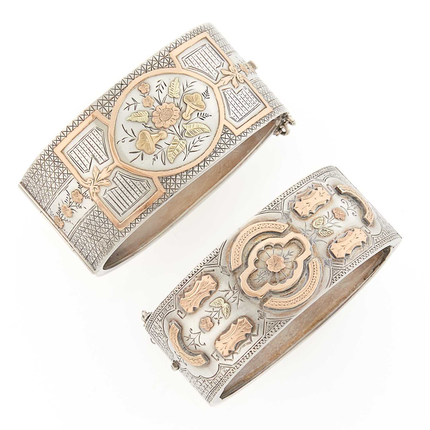 Lot 2307 - Two Antique Sterling Silver and Two-Color Gold Cuff Bangle Bracelets