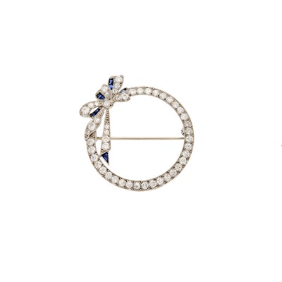 Lot 2118 - Platinum, Diamond and Sapphire Circle Bow Brooch