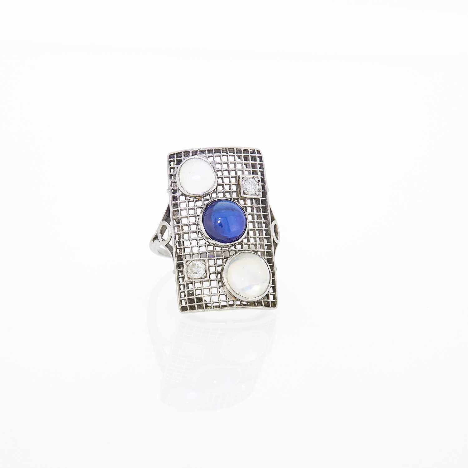 Lot 2308 - Platinum, Cabochon Sapphire, Moonstone and Diamond Filigree Ring