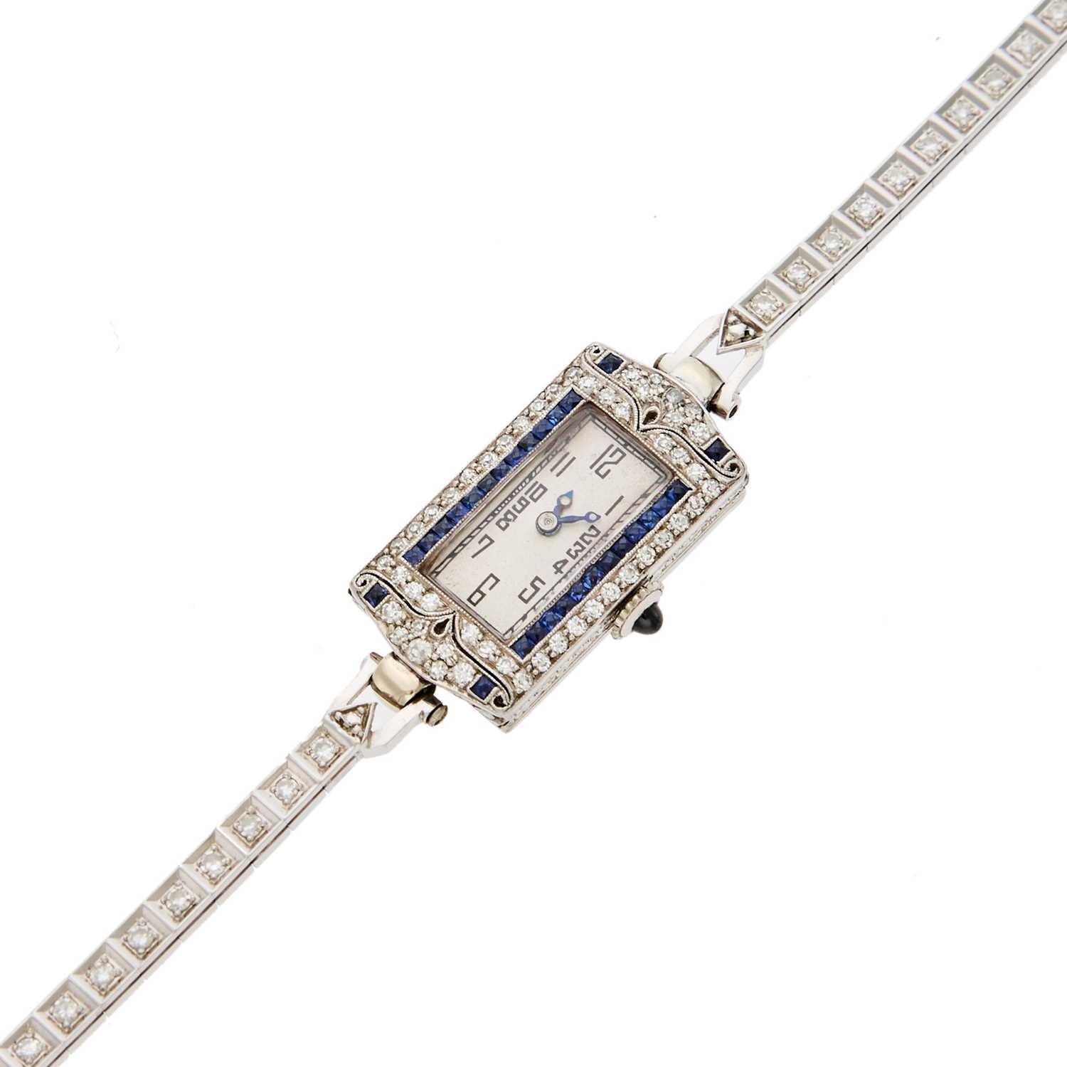 Lot 2143 - Platinum, White Gold, Diamond and Sapphire Wristwatch