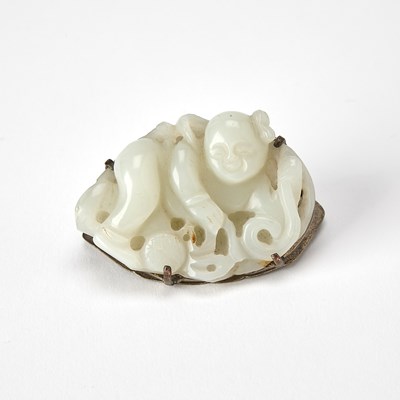 Lot 410 - A Chinese White Jade Carving of a Boy