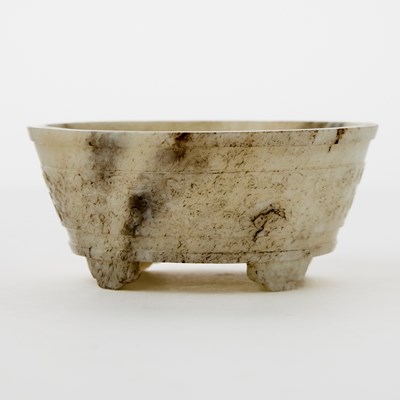 Lot 20 - A Chinese Grey Jade ‘Twin Fishes’ Tripod Bowl