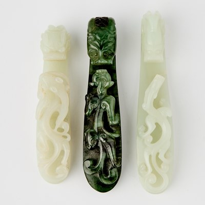 Lot 469 - Three Chinese Jade 'Dragon' Belt Hooks