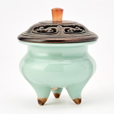 Lot 555 - A Chinese Longquan Celadon Tripod Censer