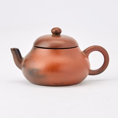 Lot 130 - A Miniature Chinese Yixing Pottery Teapot