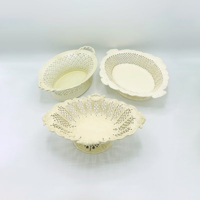 Lot 1084 - Five English Creamware Pierced Baskets or Compotes