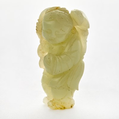 Lot 476 - A Chinese White Jade Figural Carving