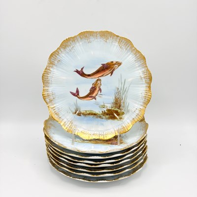 Lot 1061 - Set of Eight Limoges Gilt and Hand-Painted Porcelain Fish Plates