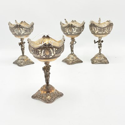 Lot 1111 - Set of Four Continental Silver and Glass Figural Salts