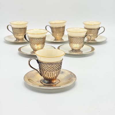 Lot 1150 - Tiffany & Co. Sterling Silver and Porcelain Demitasse Set
