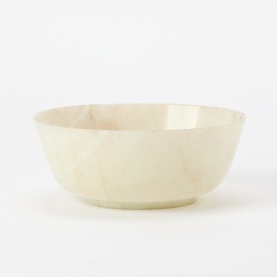 Lot 399 - A Chinese Mottled White Jade Bowl