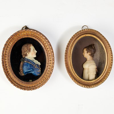 Lot 449 - Pair of Regency Framed Wax Portrait Miniatures of a Lady and a Gentleman