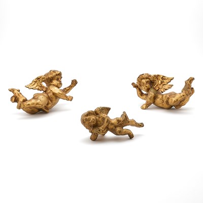 Lot 157 - Group of Three Continental Baroque Style Carved Giltwood Cherubs