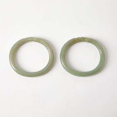 Lot 381 - A Pair of Chinese Celadon Jade Bangles