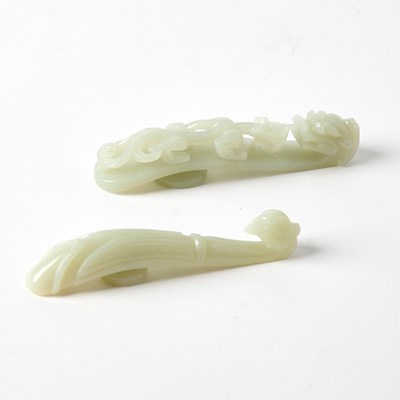 Lot 376 - Two Chinese Carved White Jade 'Dragon' Belt Hooks