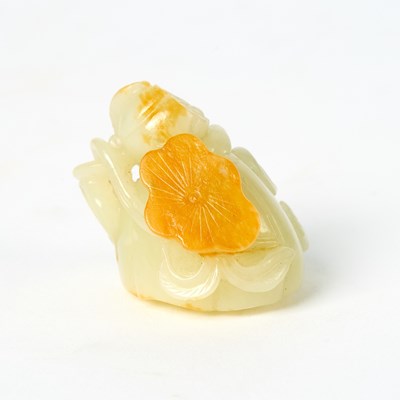 Lot 424 - A Chinese White Jade Carving of a Lotus Pod