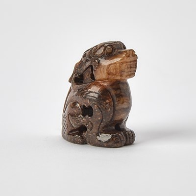 Lot 332 - A Chinese Mottled Jade Carving of a Pixiu