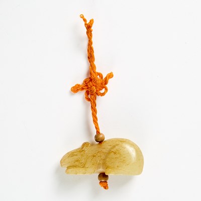 Lot 427 - A Chinese White and Russet Jade Pendant