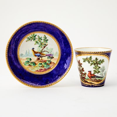 Lot 345 - Sevres Bleu Nouveau Ornithological Porcelain Cup and Saucer