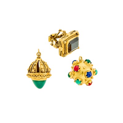 Lot 1040 - Three Gold and Hardstone Charms