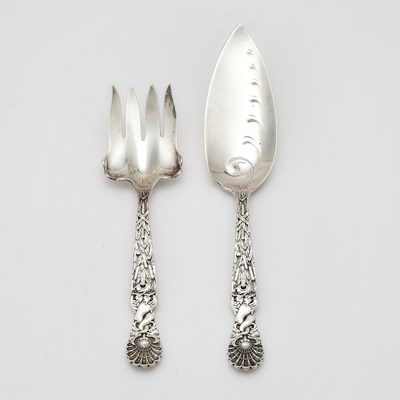Lot 138 - Two Tiffany & Co. Sterling Silver “Dolphin” Pattern Fish Servers
