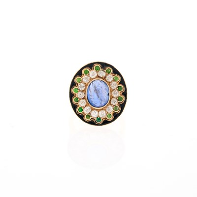 Lot 1096 - Gold, Carved Sapphire, Diamond, Demantoid Garnet and Black Enamel Ring