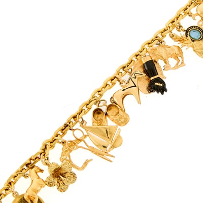Lot 1055 - Gold and Gold-Filled Charm Bracelet