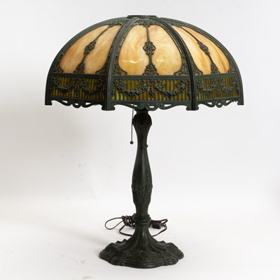 Lot 97 - American Patinated Metal and Slag Glass Table Lamp