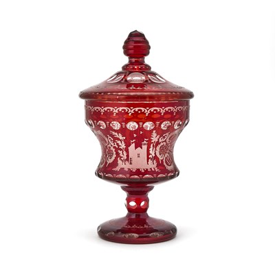 Lot 226 - Bohemian Blown, Cut, Wheel-Engraved, and Polished Ruby Flashed Glass Footed Jar and Cover