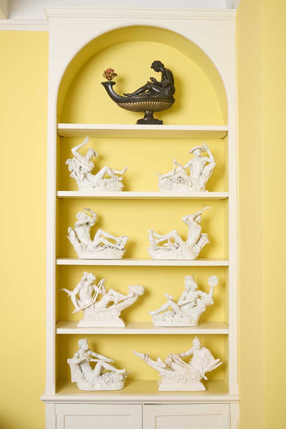 Lot A Set of Eight Italian White-Glazed Maiolica Figural Groups, by Andrea Spadini
