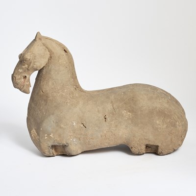 Lot 169 - A Chinese Pottery Figure of a Sitting Horse